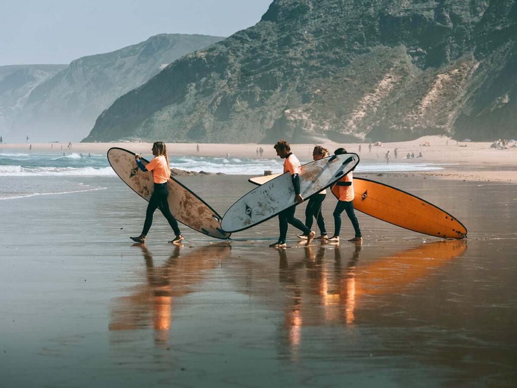 surfers get into the water